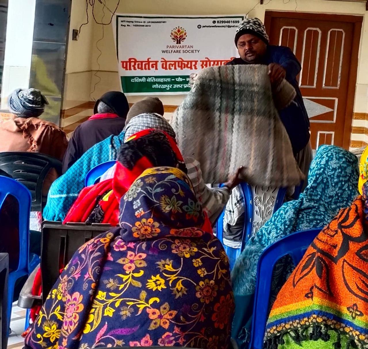 Blanket distribution to rickshaw pullers and daily workers
